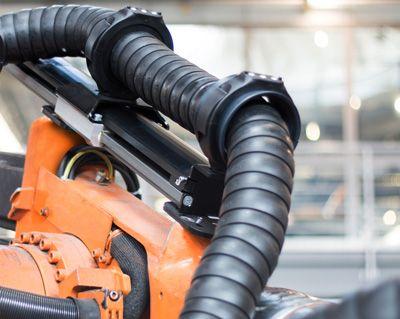 Triflex Konzept für automatischen Rückzug der Kette in Roboteranwendungen